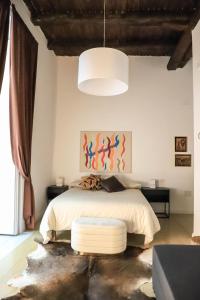 Postel nebo postele na pokoji v ubytování Le Scalette a Santa Chiara