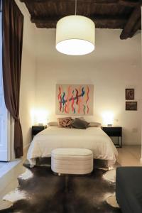 Postel nebo postele na pokoji v ubytování Le Scalette a Santa Chiara