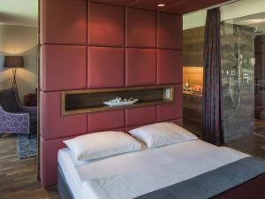 Ліжко або ліжка в номері Asia Hotel & Spa Leoben