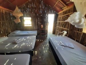 Letto o letti in una camera di Talata Hostal