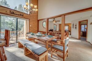 a dining room with a table and chairs at Pet-Friendly Home in Truckee with Balconies and Grill! in Truckee