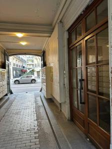 a building with a door on the side of a street at Chic studio near chatelet les halles in Paris