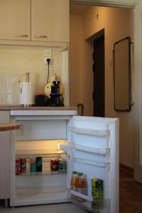 A kitchen or kitchenette at Cozy with parking