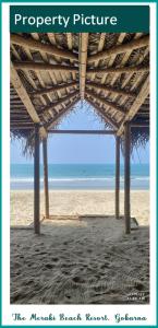 Una foto de una playa con las palabras El resort de la playa de monos para todos en The Meraki Beach Resort, en Gokarna