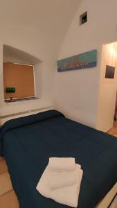 Postel nebo postele na pokoji v ubytování B&B Casa di Giò