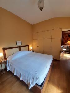 Giường trong phòng chung tại Al Cascinale
