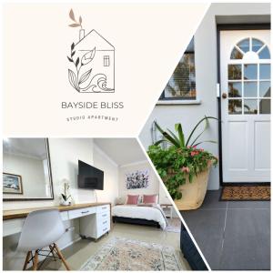 a room with a desk and a bed and a door at Bayside Bliss Studio Apartment in Summerstrand
