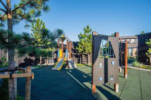 an outdoor playground with a slide and a slideintend at Ladies Group apartments Palanga Mano jūra 2 apartamentai 74G-2 in Palanga