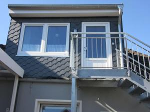 Balkón nebo terasa v ubytování Komplett ausgestattetes Apartment , Ebbe und Flut + 6 fotografií