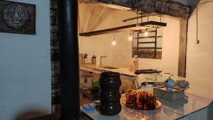 a kitchen with a counter top with a counter top at Espacio Joseana in Cerro Caqueira