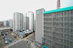 an overhead view of a city with tall buildings at MONDOMIO Sapporo S3W6 MD701 in Sapporo