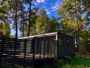 Zahrada ubytování Calma Cabins