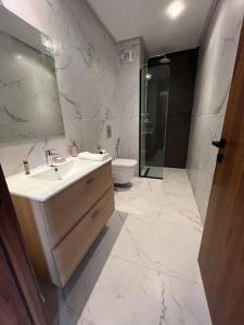 Koupelna v ubytování Luxury flat at Casa Finance city