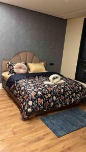 Postel nebo postele na pokoji v ubytování Luxury flat at Casa Finance city + 8 fotografií