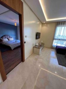 Postel nebo postele na pokoji v ubytování Luxury flat at Casa Finance city