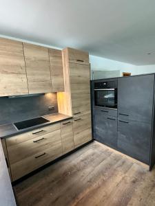 Dapur atau dapur kecil di Deluxe Apart Bader