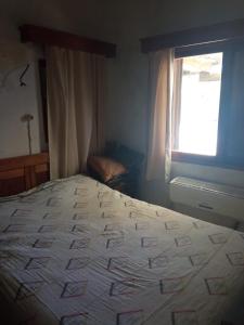 Kama o mga kama sa kuwarto sa Arcadio Hostel Punta del Diablo