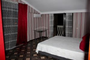 Letto o letti in una camera di Sunrise Hotel