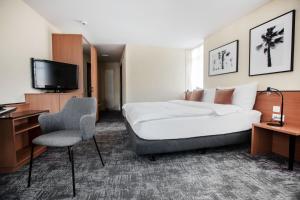Postelja oz. postelje v sobi nastanitve HOTEL ENGEL LIESTAL - Business & Lifestyle