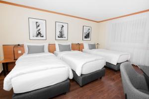 Postelja oz. postelje v sobi nastanitve HOTEL ENGEL LIESTAL - Business & Lifestyle