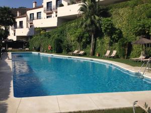 Bazén v ubytovaní El Casar Apartments alebo v jeho blízkosti
