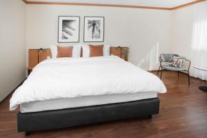Postelja oz. postelje v sobi nastanitve HOTEL ENGEL LIESTAL - Business & Lifestyle