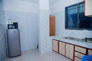 Kuchyň nebo kuchyňský kout v ubytování MEcasa bamburi fisheries + 10 fotografií