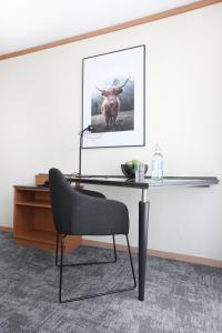 TV in/ali zabaviščno središče v nastanitvi HOTEL ENGEL LIESTAL - Business & Lifestyle