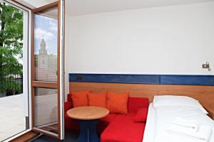 Letto o letti in una camera di Hotelový dům Kaskáda - Bed and Breakfast