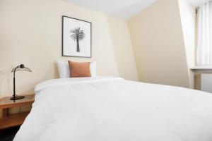 Postelja oz. postelje v sobi nastanitve HOTEL ENGEL LIESTAL - Business & Lifestyle