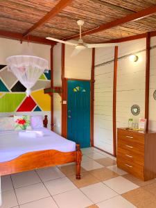 Letto o letti in una camera di Le Petit Paradis
