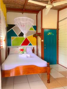 Letto o letti in una camera di Le Petit Paradis