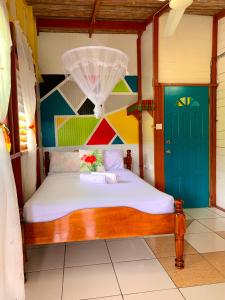 Letto o letti in una camera di Le Petit Paradis