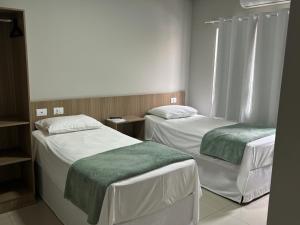 Postel nebo postele na pokoji v ubytování Mahle Hotel + 10 fotografií