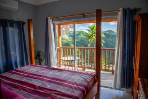 מיטה או מיטות בחדר ב-Majestic Ridge Villas