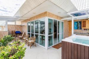 Imagen de la galería de Duplex vista para o mar na praia dos Açores, en Florianópolis 29 fotos más