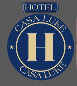 a sign that reads hotel acacia la lucida at HOTEL CASA LUKE in Neiva