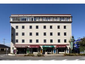 a large white building with a lot of windows at Business Green Hotel Hino - Vacation STAY 16322v in Hino