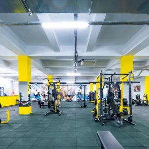 a gym with lots of equipment in a building at Luxury Apartment POOL SPA GYM 1+1 in Antalya