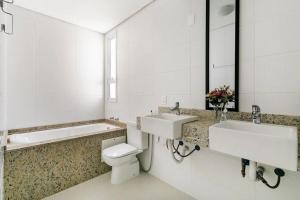 ภาพในคลังภาพของ Duplex vista para o mar na praia dos Açores ในฟลอเรียนอโปลิส