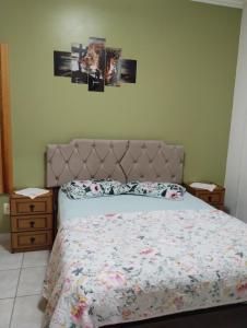 Ένα ή περισσότερα κρεβάτια σε δωμάτιο στο Apartamento na Praia