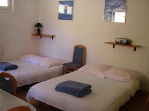 Postel nebo postele na pokoji v ubytování Petar Apartment