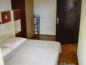 Postel nebo postele na pokoji v ubytování Petar Apartment