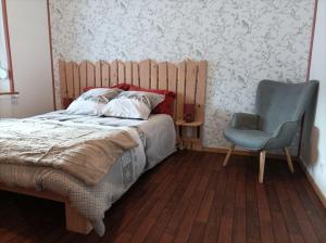 Postel nebo postele na pokoji v ubytování Marguerite