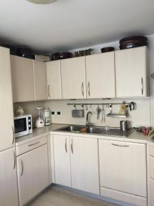 Kuchyňa alebo kuchynka v ubytovaní Apartment Whenlifeisbetter