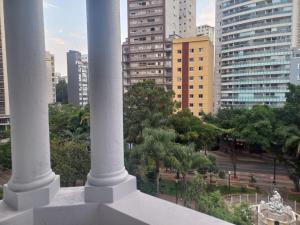 a view of a city with tall buildings at Flat - Apartium Palacete Victória in Sao Paulo