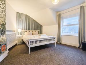 Katil atau katil-katil dalam bilik di Albert Road Homestay