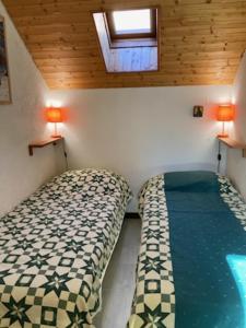 Ένα ή περισσότερα κρεβάτια σε δωμάτιο στο Cozy and charming 40 m in Le Monêtier-les-Bains