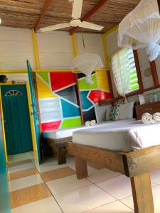 Letto o letti in una camera di Le Petit Paradis