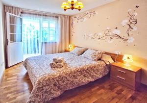 A bed or beds in a room at Apartamento completo con wifi en Betanzos